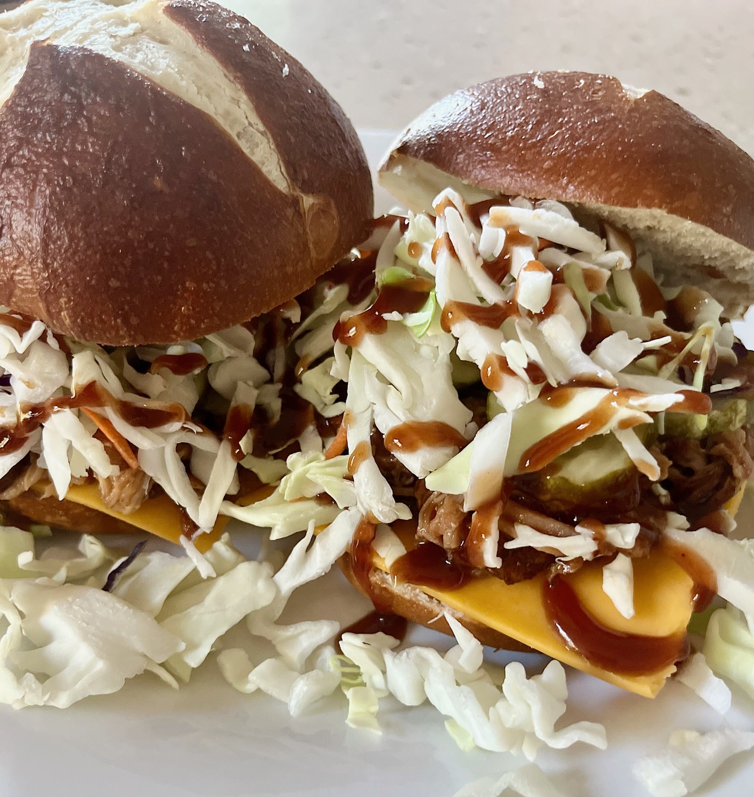 Pulled Pork Sandwiches on Pretzel Buns